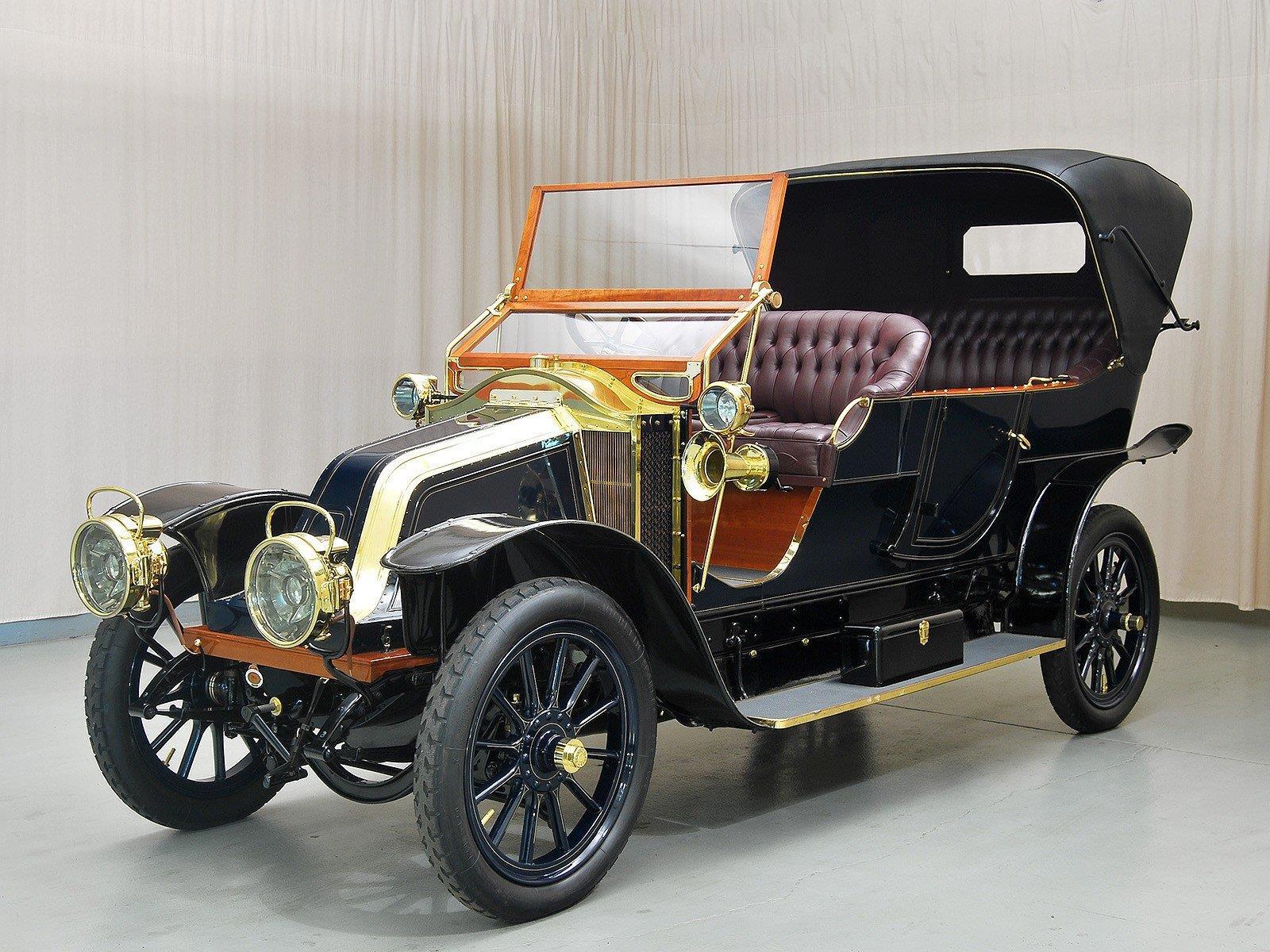 Какую можно купить первую машину. Renault AG-1 1909. Renault k 1900. 1916 Renault. Автомобиль Рено 1909 года.